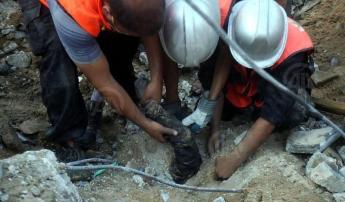 rescuers find an arm