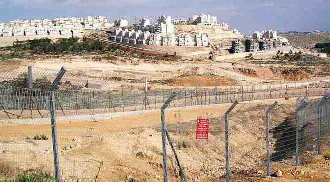 Illegal Jewish settlement colony and concertina wire